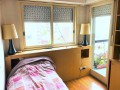 DORMITORIO AL CONTRAFRENTE Y SALIDA A BALCON
